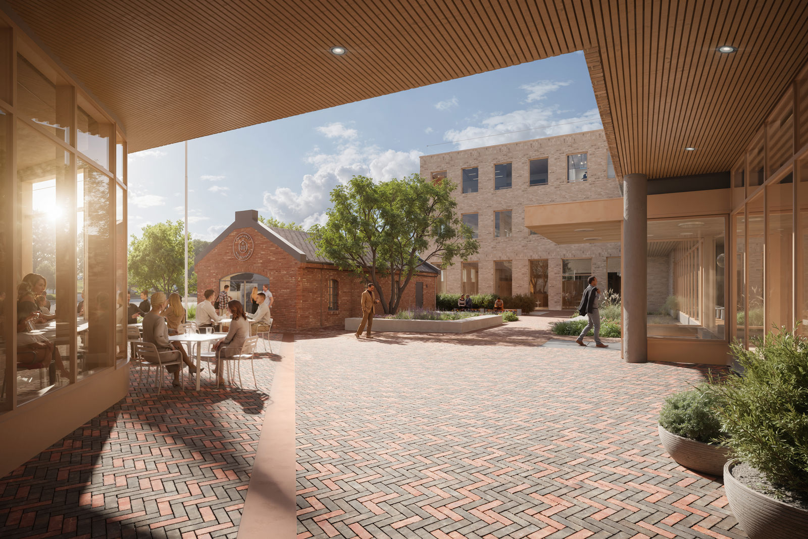 Smie foran stort administrasjonsbygg